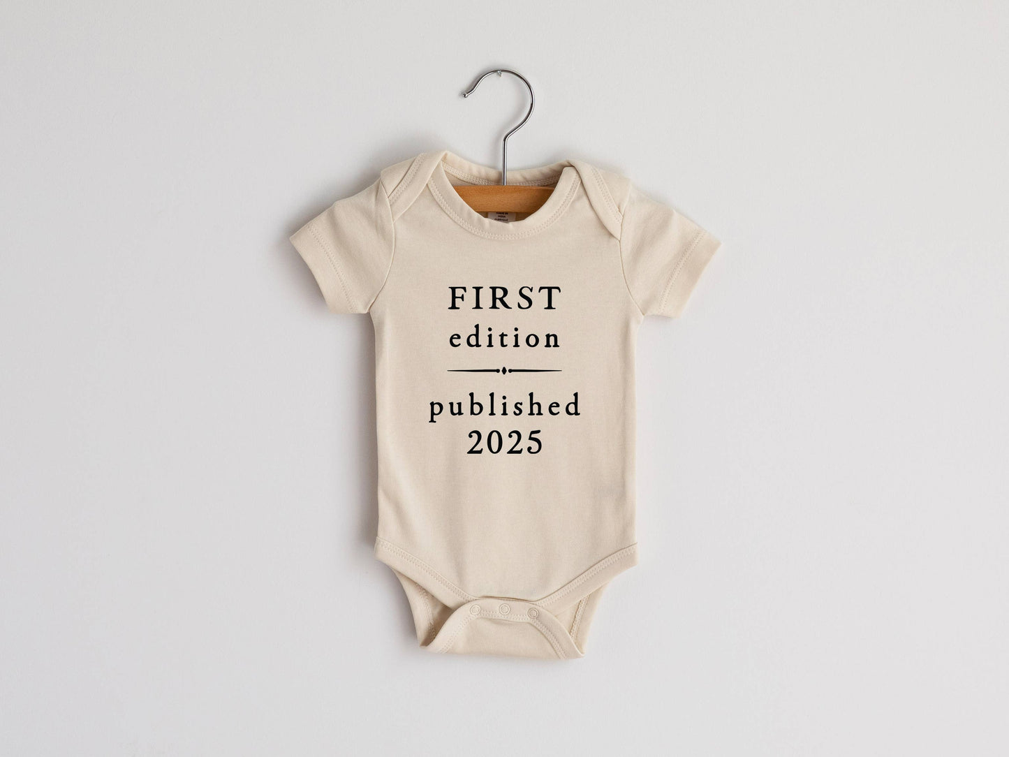 Cream First Edition 2025 Book Style Organic Baby Bodysuit - 85 Local