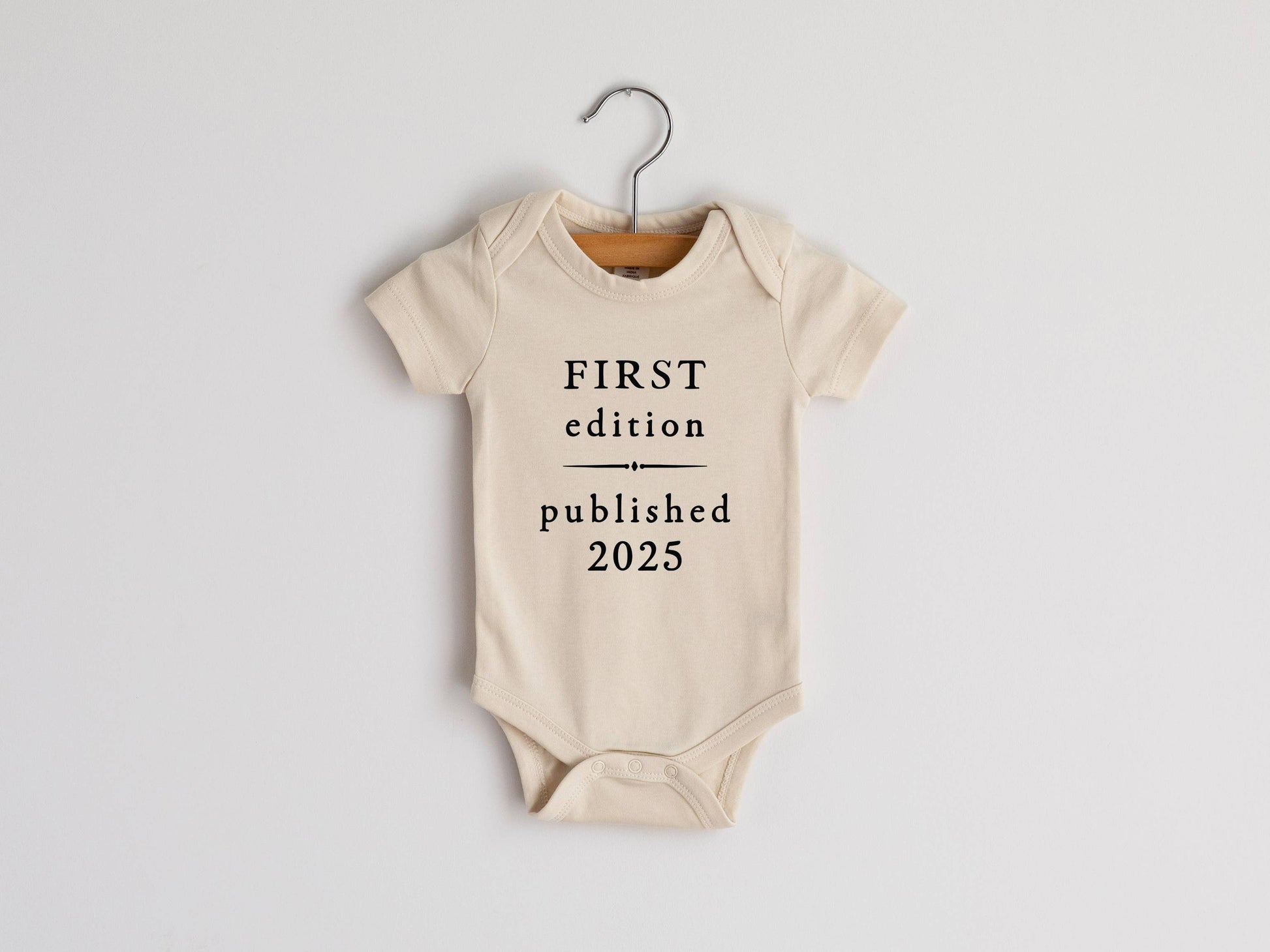 Cream First Edition 2025 Book Style Organic Baby Bodysuit - 85 Local