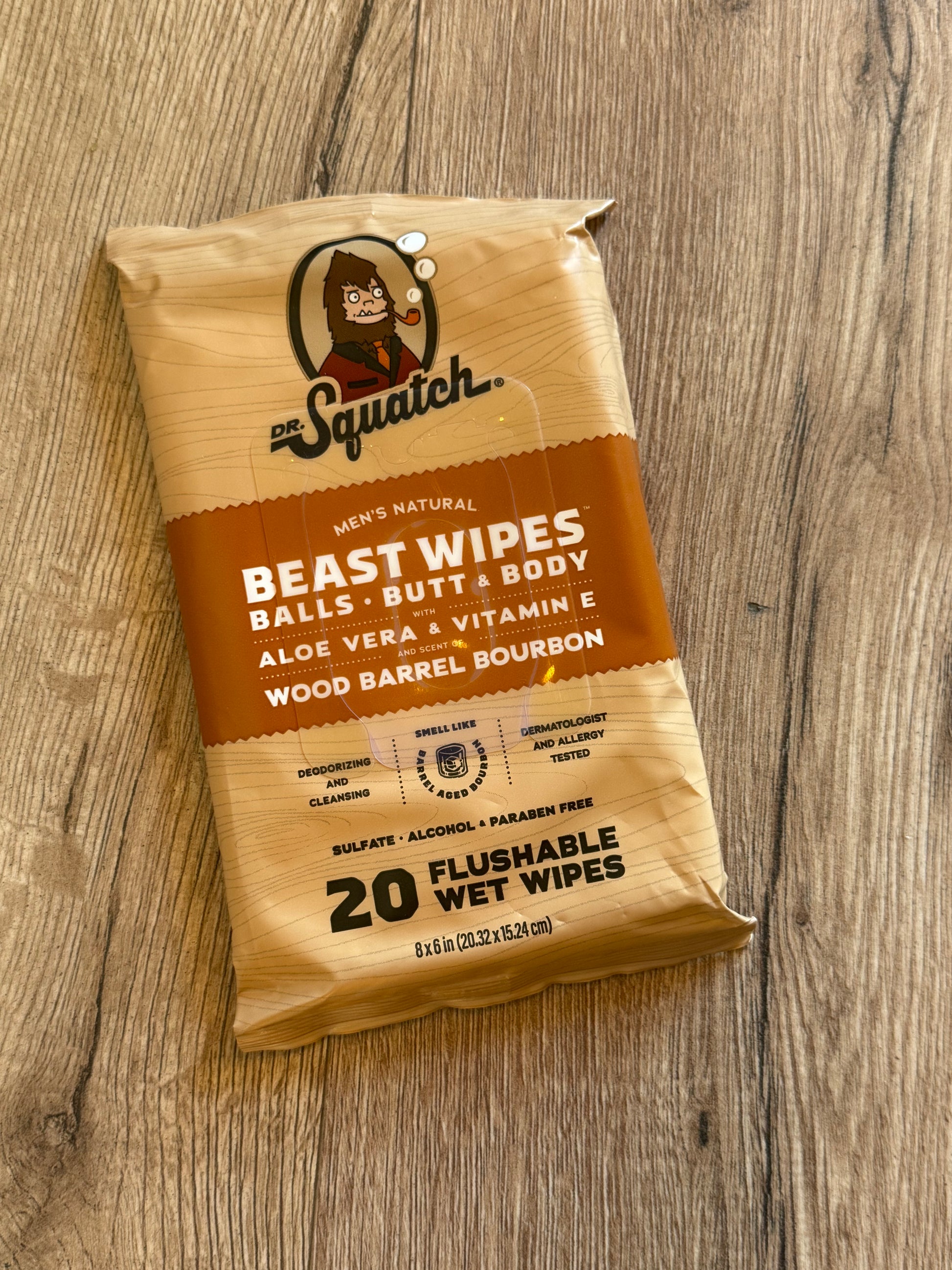 Package of Squatch Beast Wipes on a wooden surface