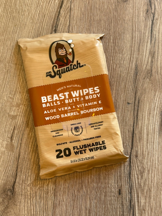 Package of Squatch Beast Wipes on a wooden surface
