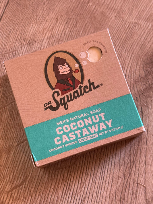 Box of dr. Squatch coconut soap on a wooden surface