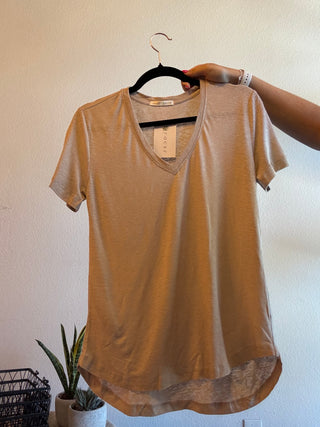 khaki colored v-neck shirt