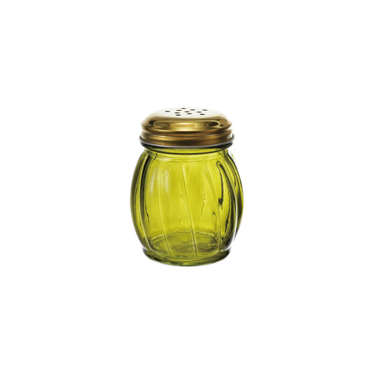 Green glass shaker with brass lid on a white background